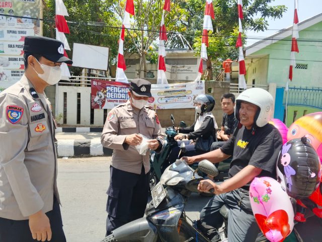 Begini Sat Set-nya Polres Bogor Antisipasi Abu Vulkanik Gunung Anak Krakatau, Langsung Turun ke Jalan Bagikan Masker